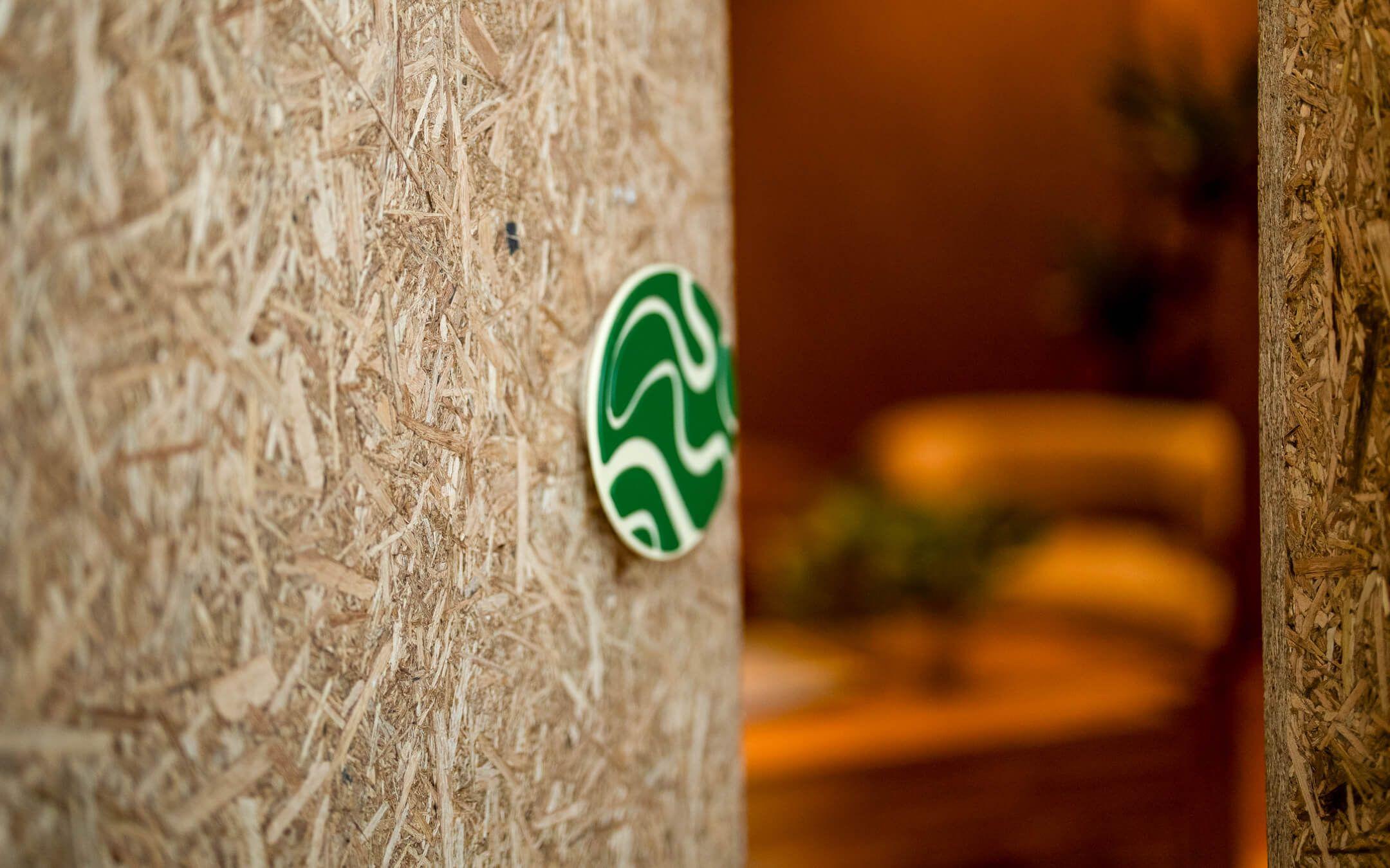 Desert Board, an innovative material made from regenerated palm tree biomass, forms the walls of The Climate Tribe Hub.
Photo: The Climate Tribe