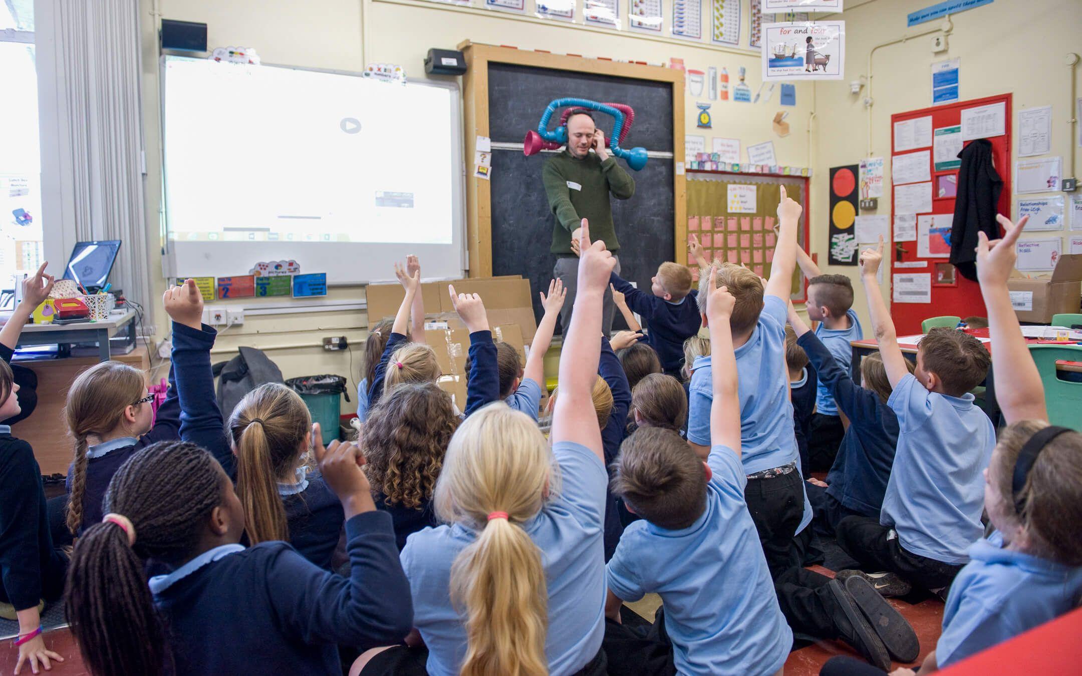 Dominic leads a workshop for children, encouraging them to use their imaginations and creativity to discover unique solutions. 
Photo: Little Inventors