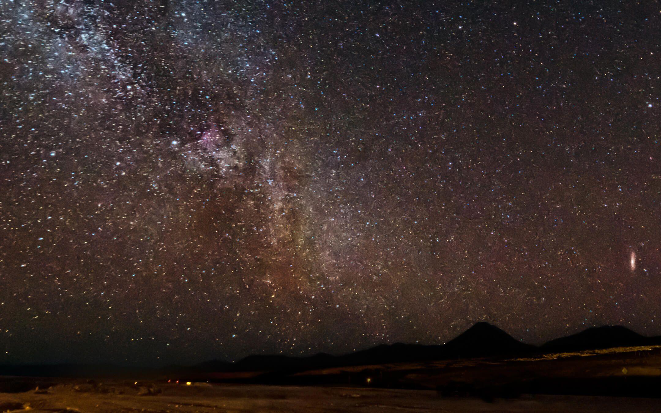 The Milky Way and Andromeda Galaxy over the volcano Licancabur taken from the ALMA radio telescope facility in the Atacama desert, Chile.
Photographer: Frank Turina