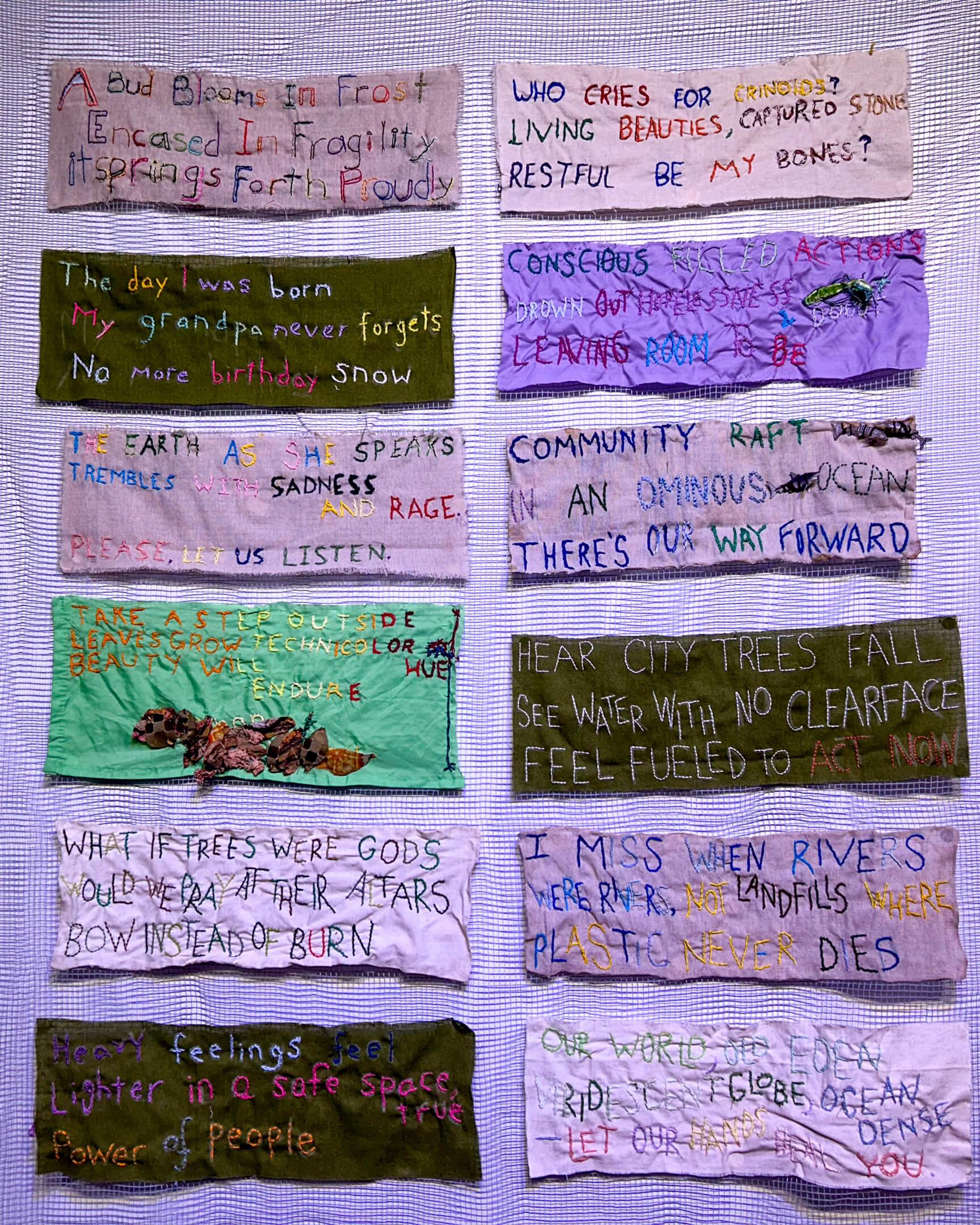 Processing through poetry and other forms of artistic self-expression is a common occurrence at Climate Cafe NYC. Here, Climate Haikus are displayed at the Earth Sessions Festival.

Photo: Climate Cafe NYC