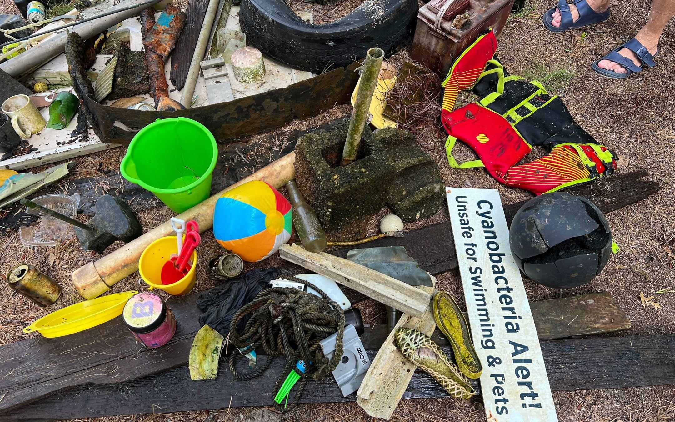 A collection of trash fished out of a New England pond by the intrepid Old Ladies Against Underwater Garbage (OLAUG).
Photo: Old Ladies Against Underwater Garbage