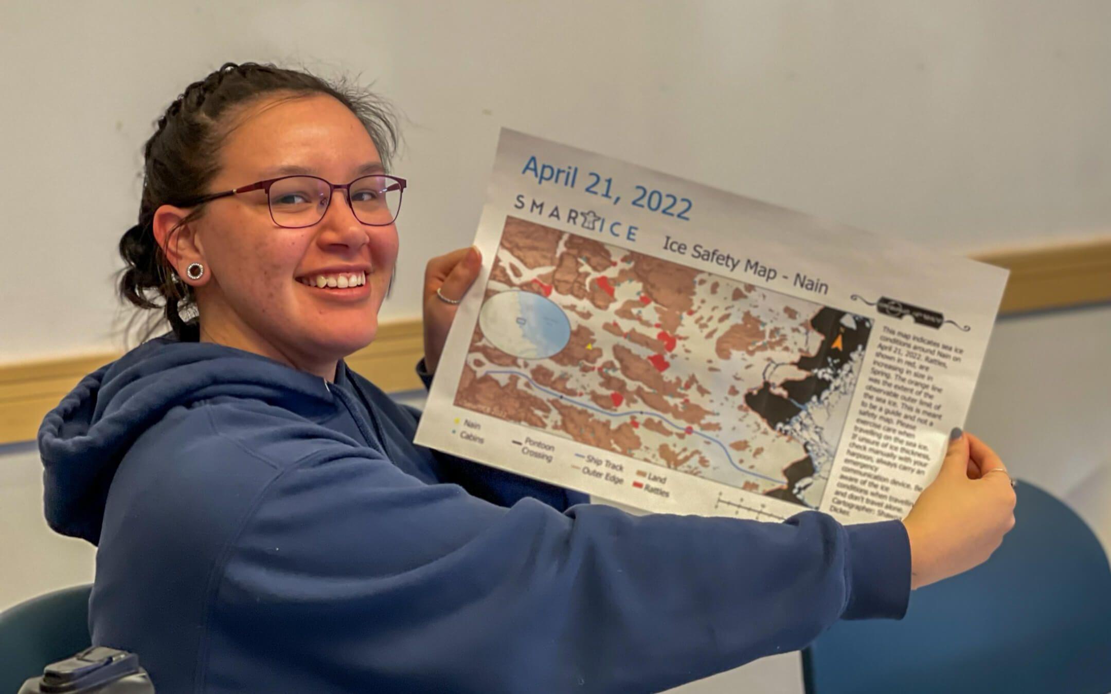Shawna Dicker and one of the ice safety maps she created of her home community (Nain, Nunatsiavut) as a graduate of the Sikumik Qaujimajjuti Program.
Photo: SmartICE